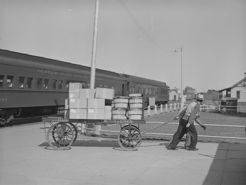 Pulling Carload Of Express Packages Away From Train Immediately After The Arrival Of The Morning Train, Montrose