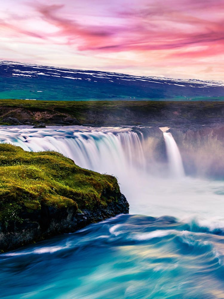 Waterfall At Sunset In Iceland