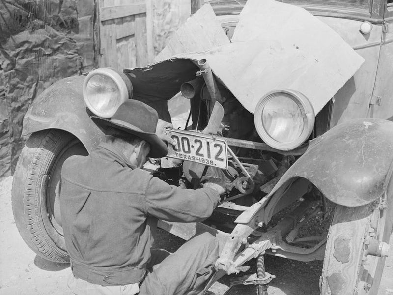 Mexican Repairing Automobile, San Antoni, Texas, Notice The Worn Out Tires By Russell Lee