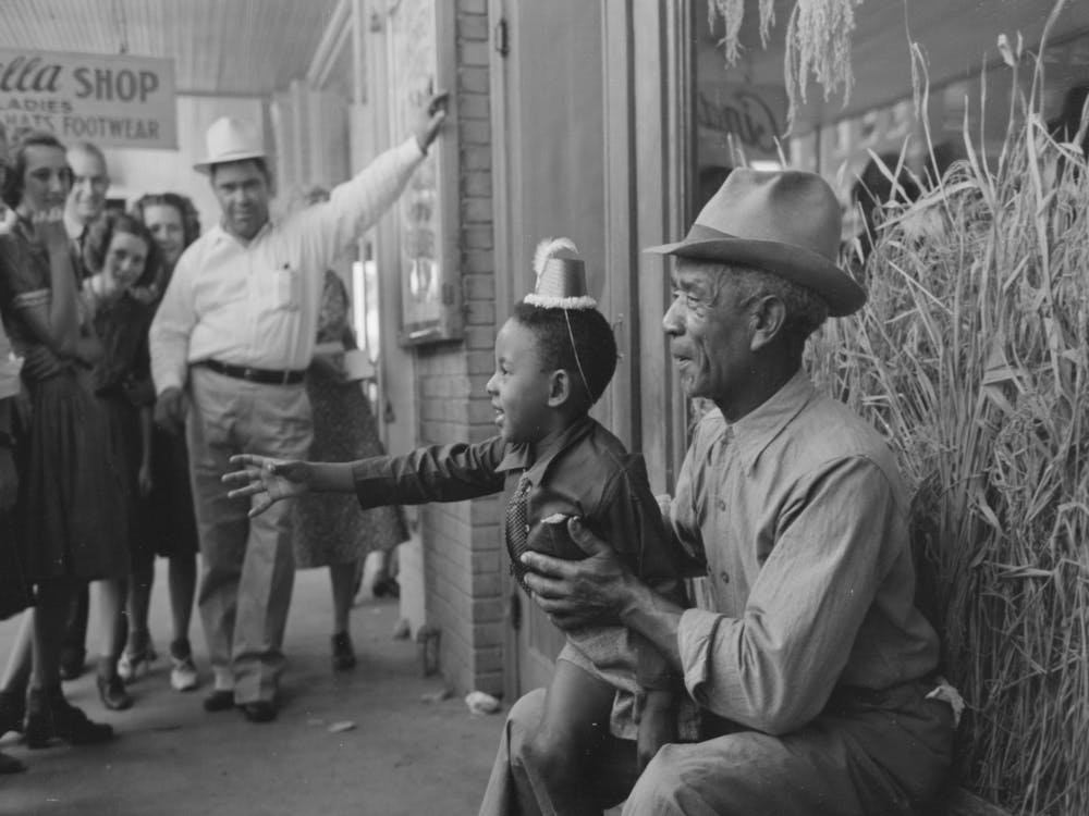 Untitled Photo, Possibly Related To Mother With Two Children With Popcorn, National Rice Festival, Crowley