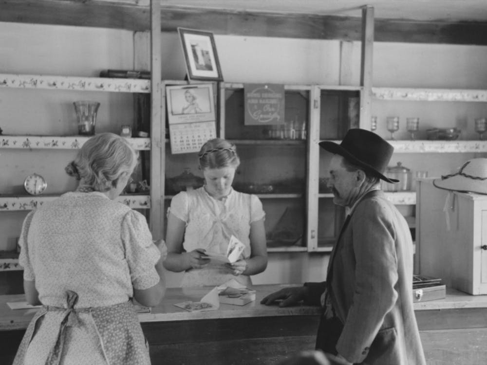 Louis Stagg Who Runs The Cafe And Her Mother Looking At Greeting Cards Which The Salesman Has, Pie Town, New