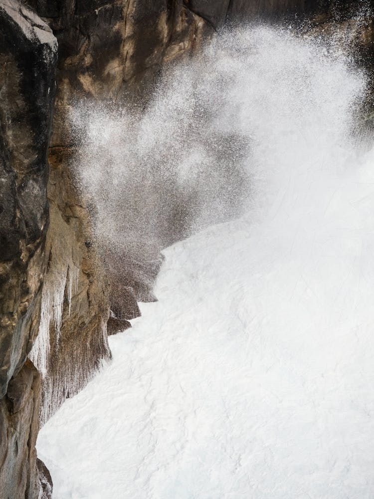 Churning Ocean Against Rocky Cliffs