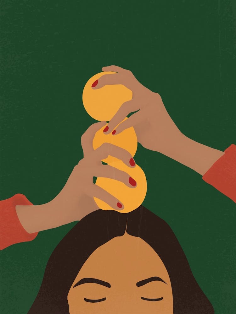 Woman Balancing Lemons On Her Head