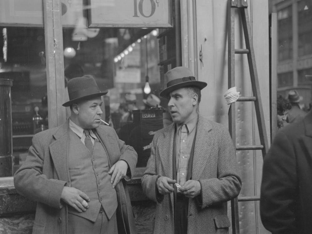 Two Men In Conversation, 7th Avenue Near 38th Street, New York City By Russell Lee