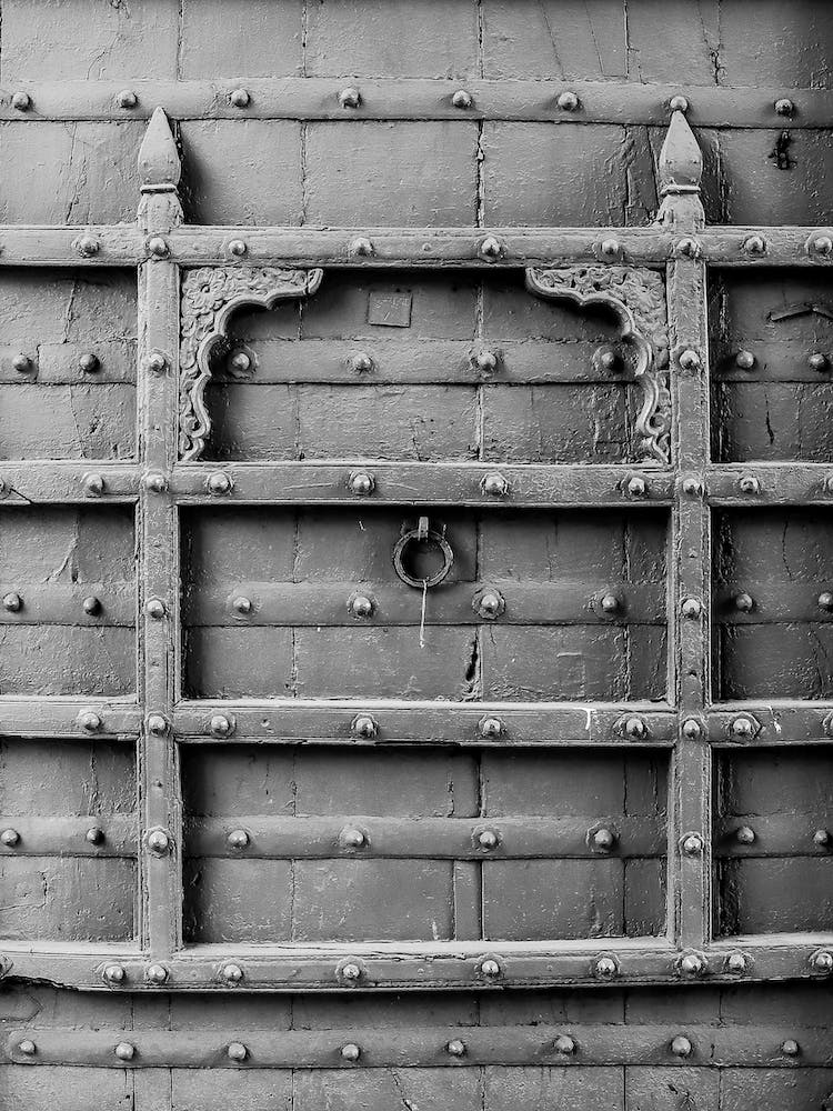 Black And White Photograph Of A Door