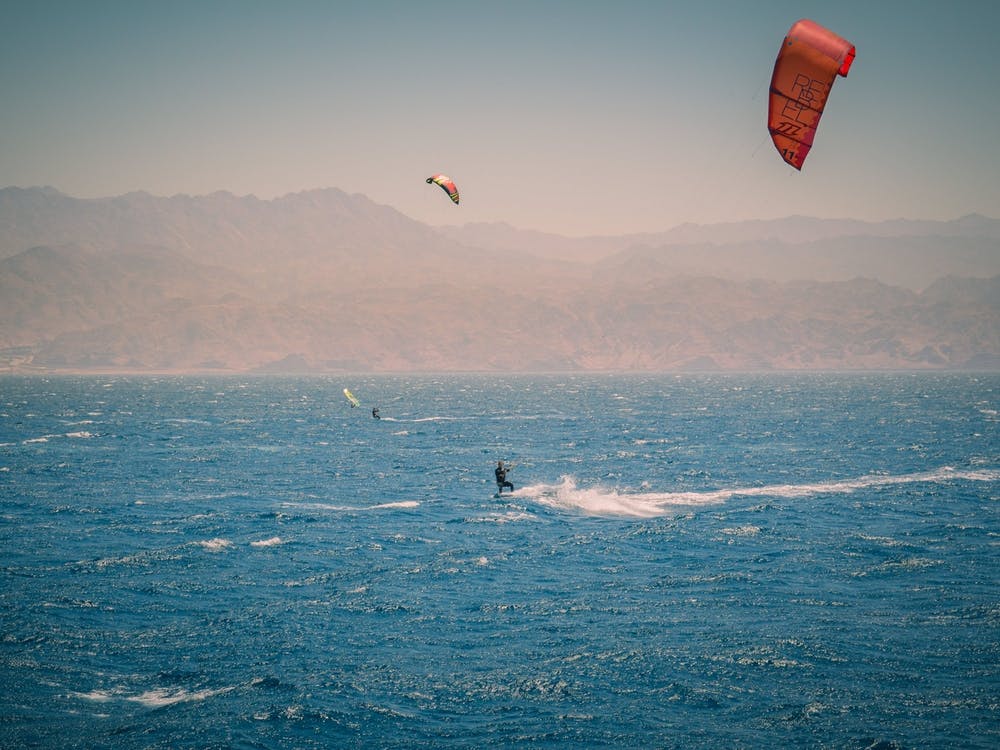 Windsurfers Sailing In The Red Sea