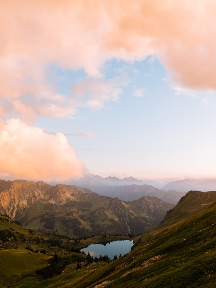 Sunset And A Mountain Lake In The Alps