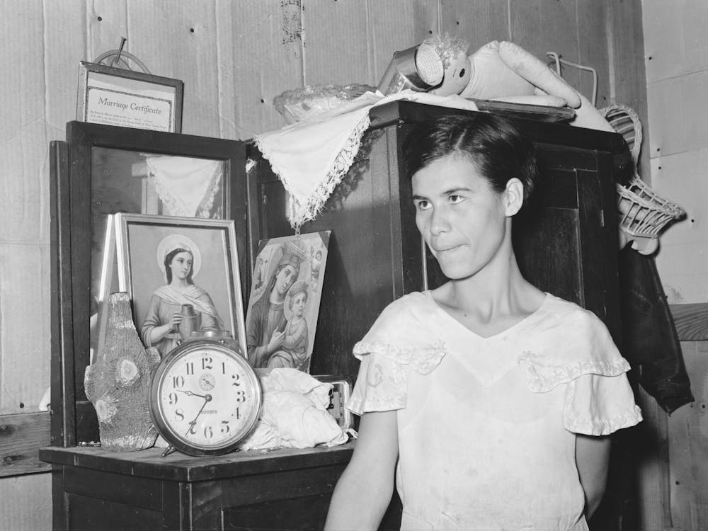 Mexican Woman Standing In Front Of Bureau, San Antonio, Texas By Russell Lee