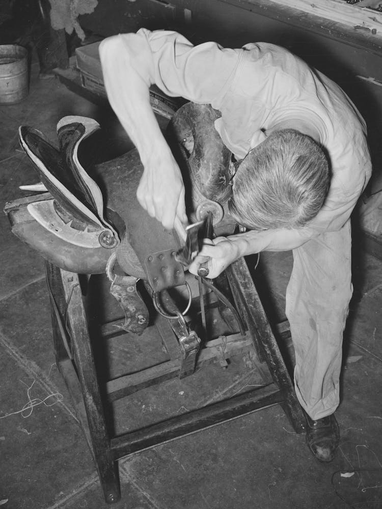 Rivet Work In Saddle Repair Shop, Alpine, Texas By Russell Lee