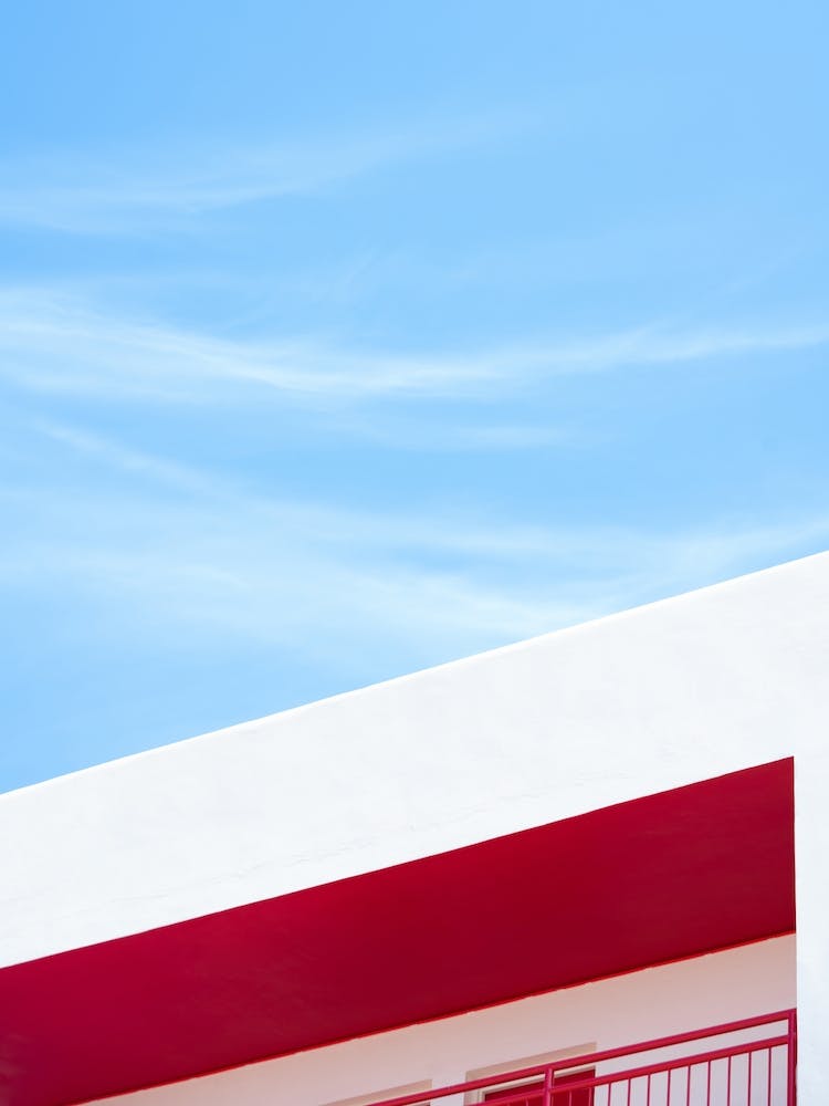 Red Motel Balcony Blue Sky