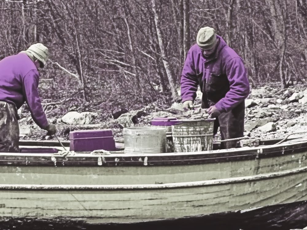 Two Men In A Boat Fisherman