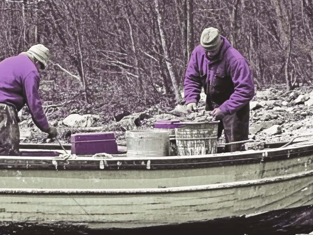 Two Men In A Boat Fisherman