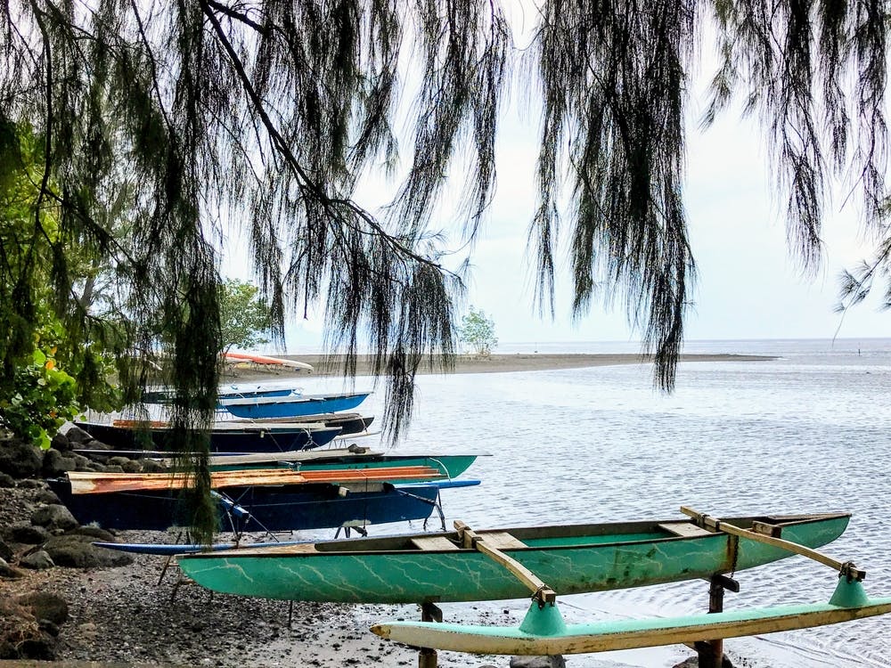 Long Boats On The Beach In French Polynesia