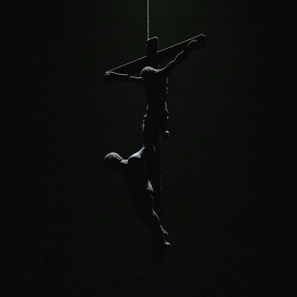 Silhouette Of Jesus On The Cross