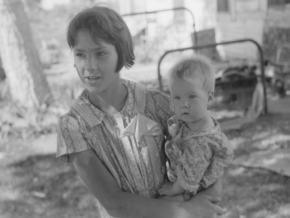 Young Girl Holding Baby Brother In Her Arms, Community Camp, Oklahoma City Oklahoma By Russell Lee