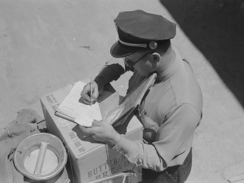 Stage Driver Making Out Express Receipt, Pie Town, New Mexico By Russell Lee