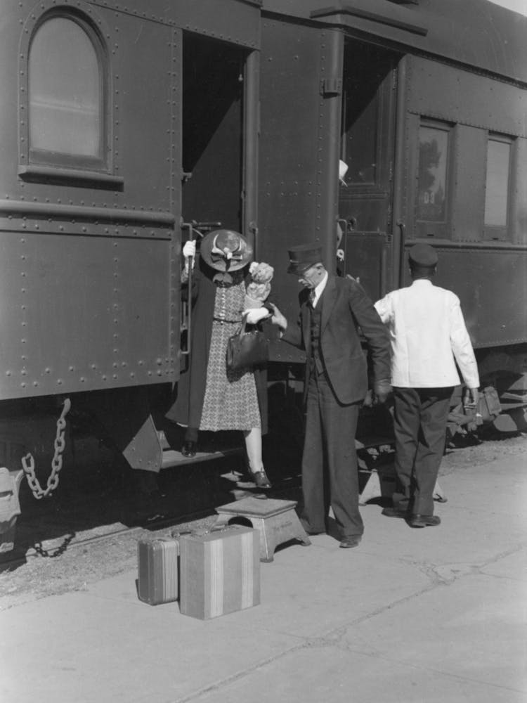 Passenger, Alighting From Morning Train, Montrose, Colorado By Russell Lee