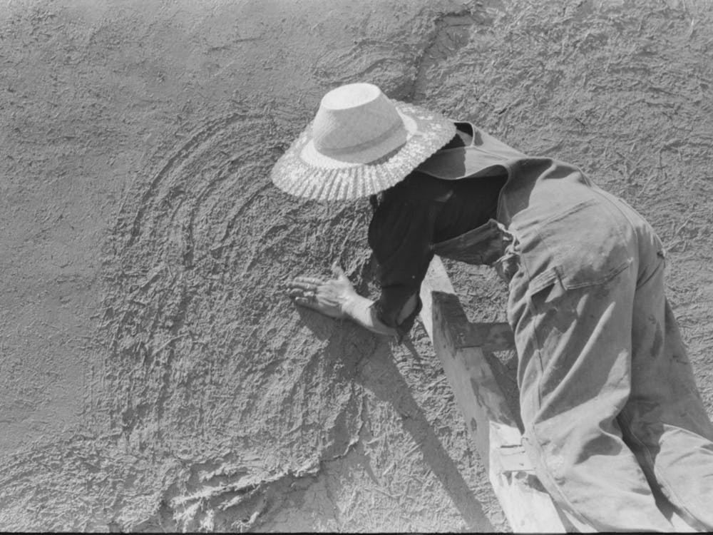 Untitled Photo, Possibly Related To Spanish American Women Plastering Adobe House, Chamisal, New Mexico