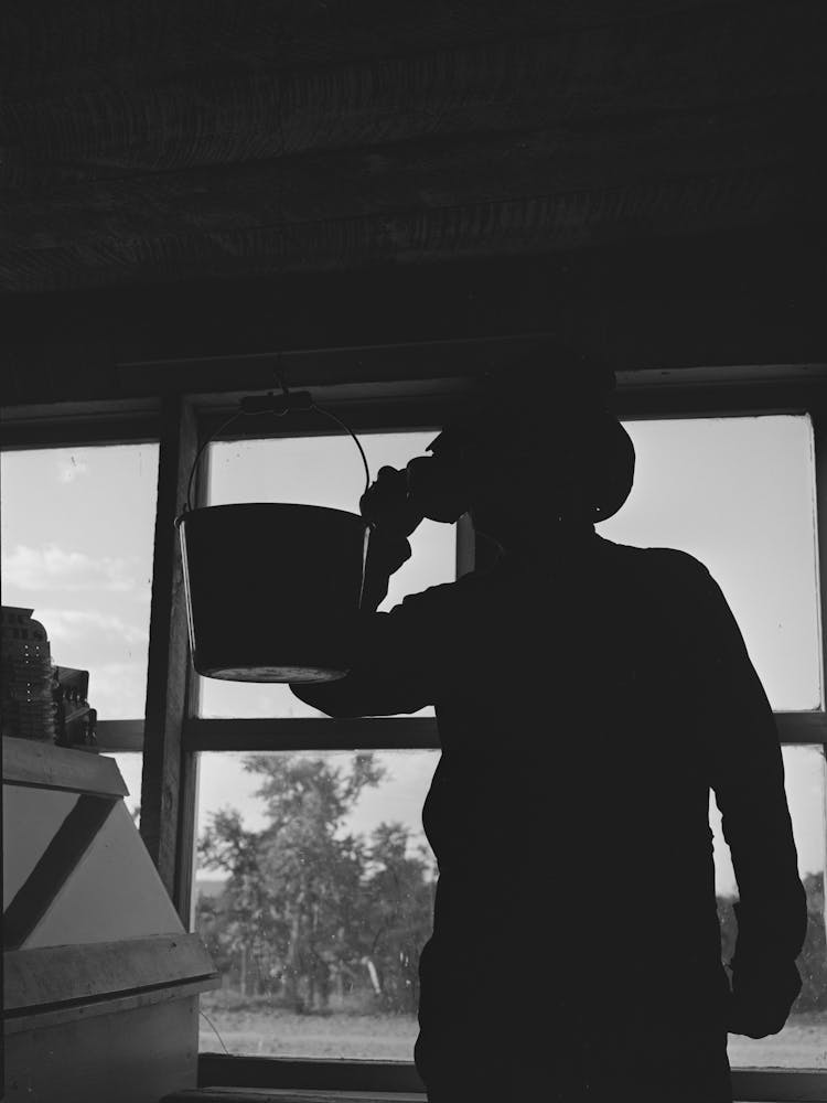 Untitled Photo, Possibly Related To Farmer Drinking Water From Bucket Which Hangs In The General Store