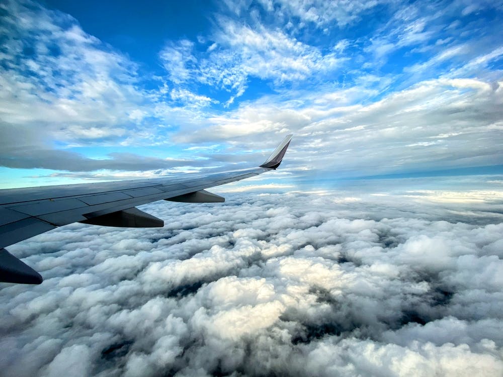 Airplane Wing Above Clouds (Shots From Planes Series)