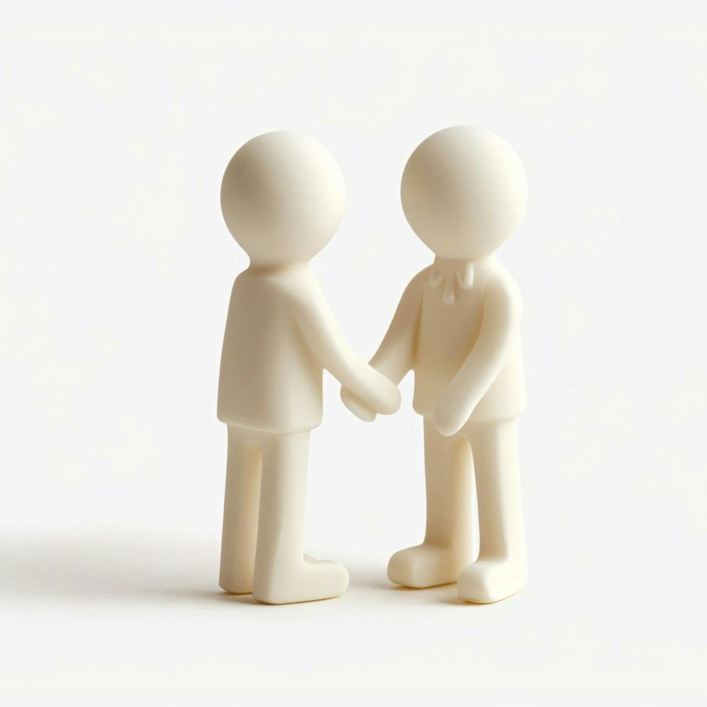 Two People Shaking Hands