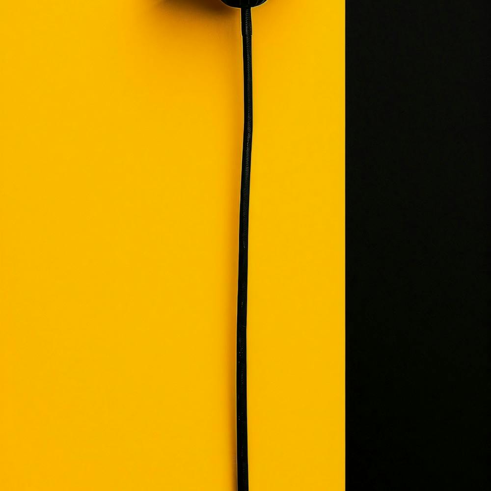 Earphones On A Yellow Background