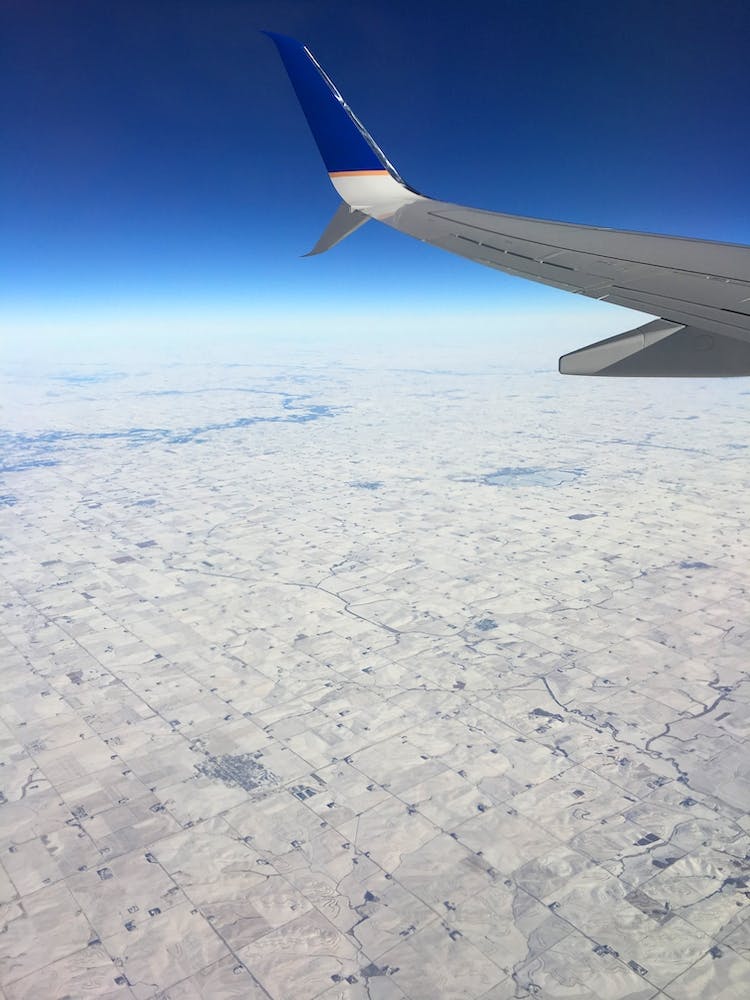 Plane ride over snowy land 1