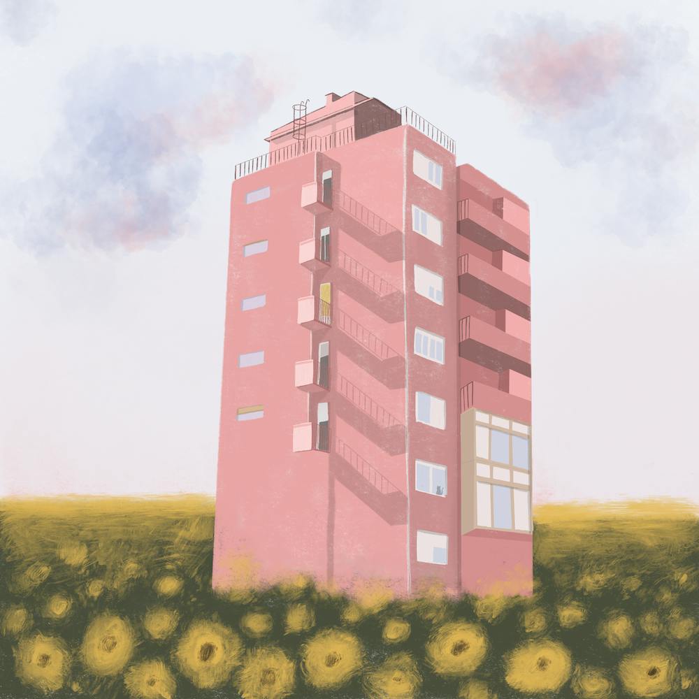 Pink Building With Sunflowers