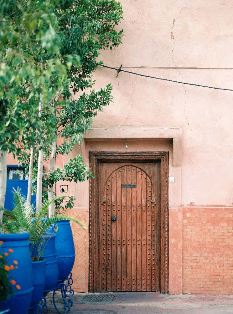 Marrakech Wooden Door On Coral Wall