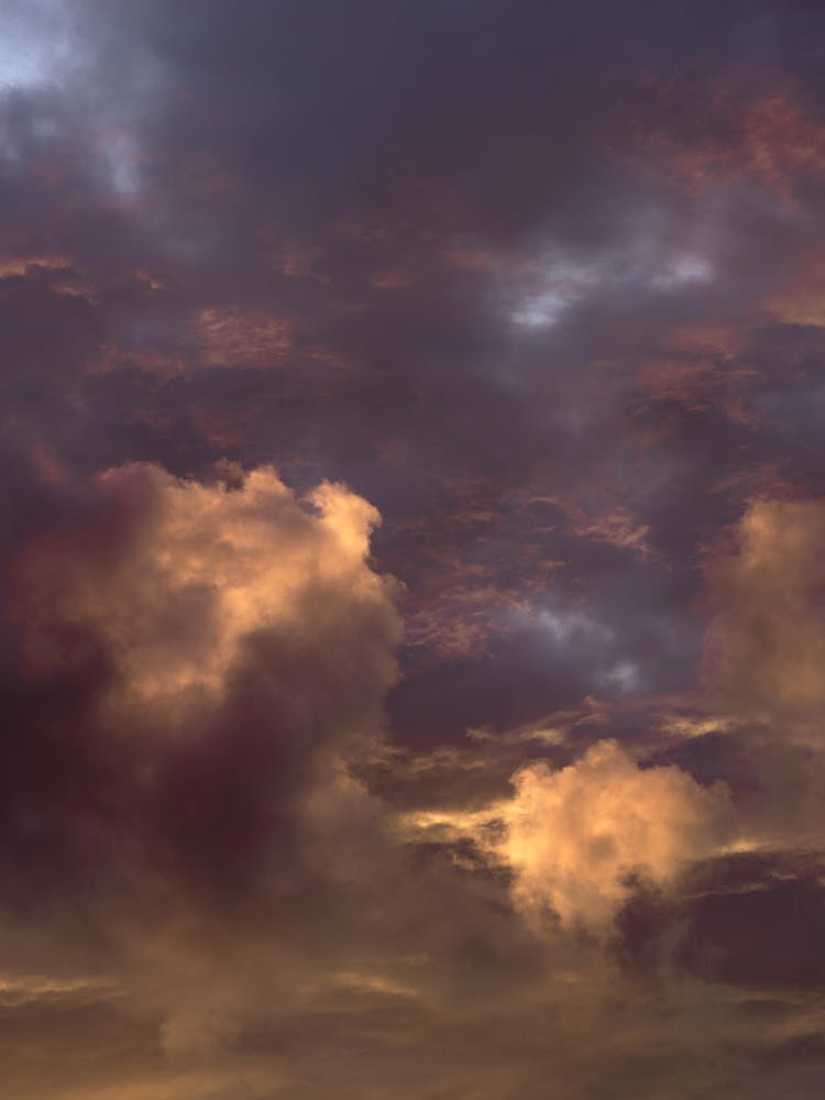 Sunset With Orange And Purple Clouds