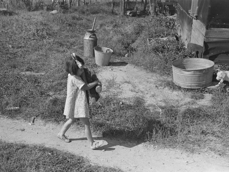 Little Girl Carrying Firewood On Farm Near Northome, Minnesota By Russell Lee