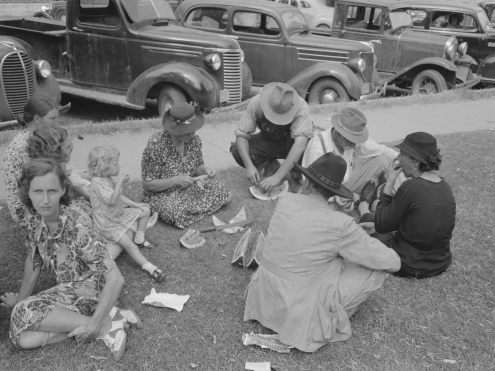 Farm People Eating Watermelon On Lawn In Front Of Courthouse, Tahlequah, Oklahoma By Russell Lee