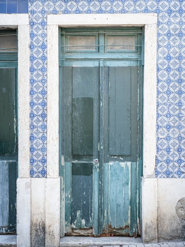 Blue Wall And Turquoise Wooden Door