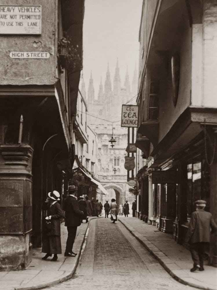 Old Photo Of A Narrow Street With People 3302248