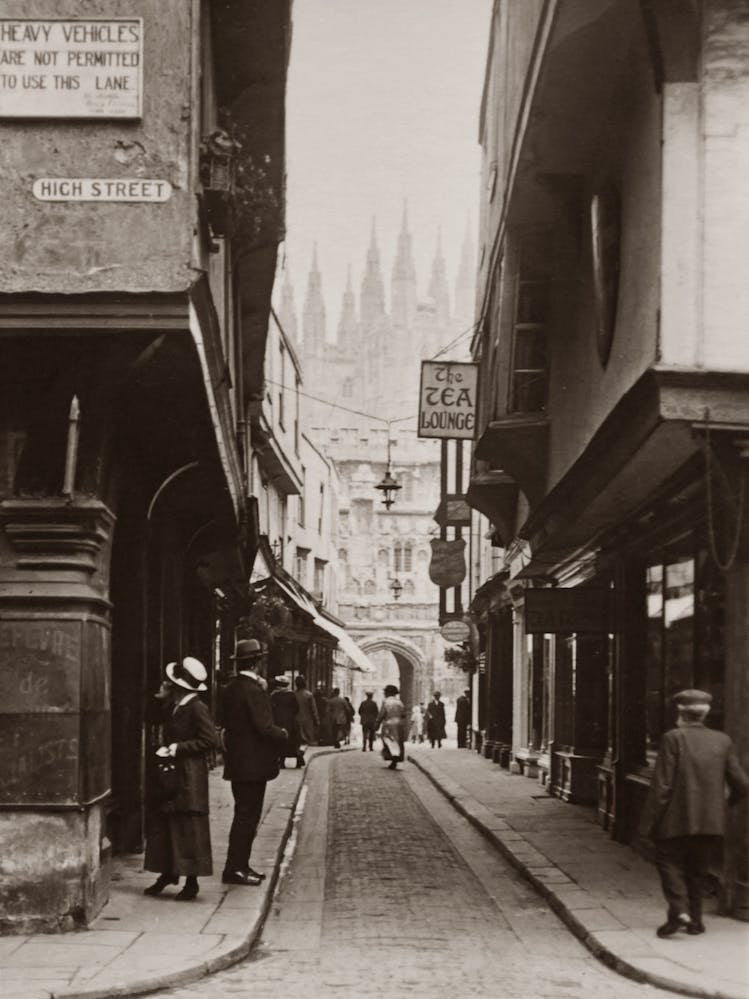 Old Photo Of A Narrow Street With People 3302248