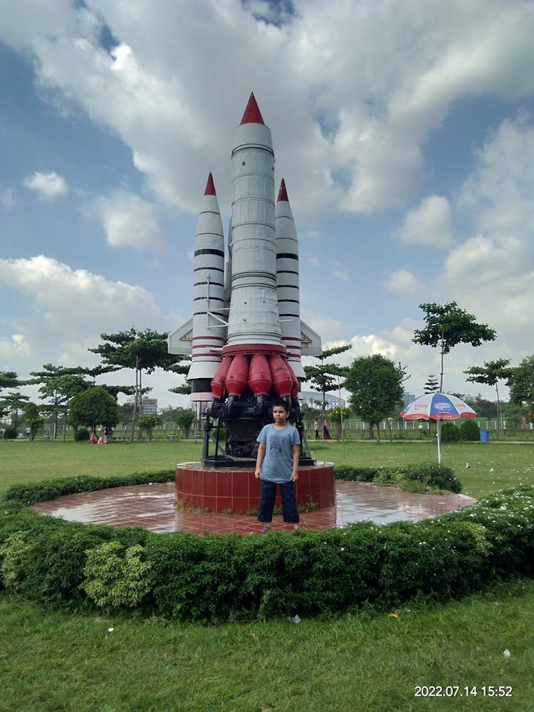 Artificial Space shuttle in a park covering a vibrant blue sky