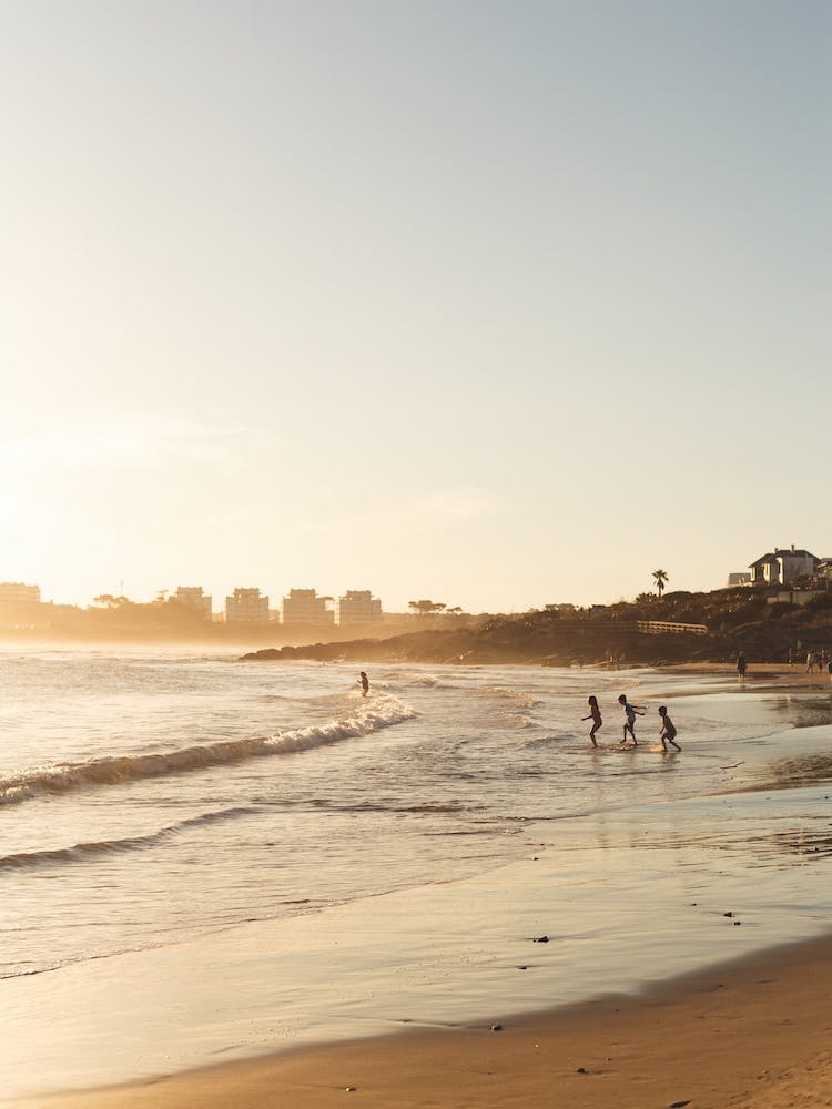 Happy Sunset At The Beach