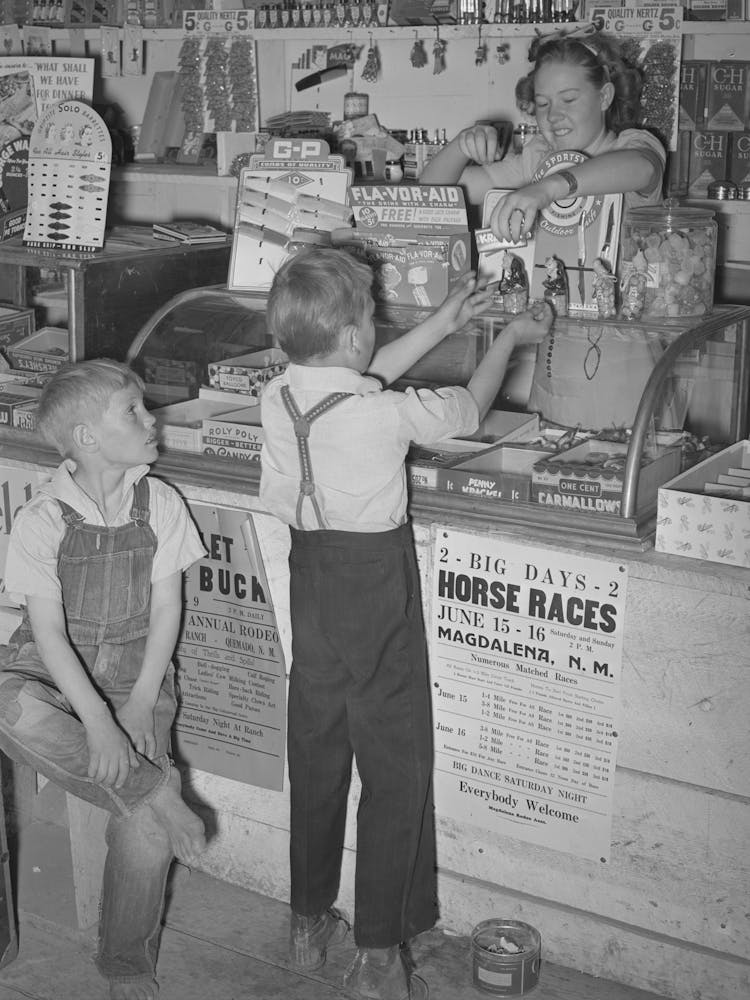 Farm Children Buying Candy At The General Store At Pie Town, New Mexico By Russell Lee