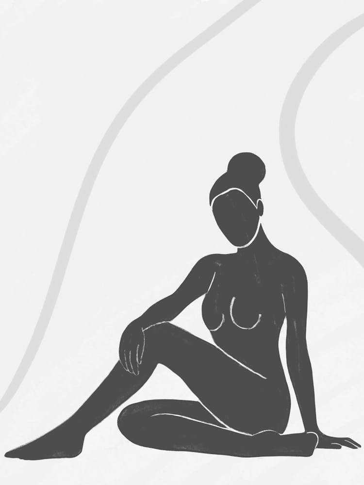 Nackte Frau auf dem Boden sitzend