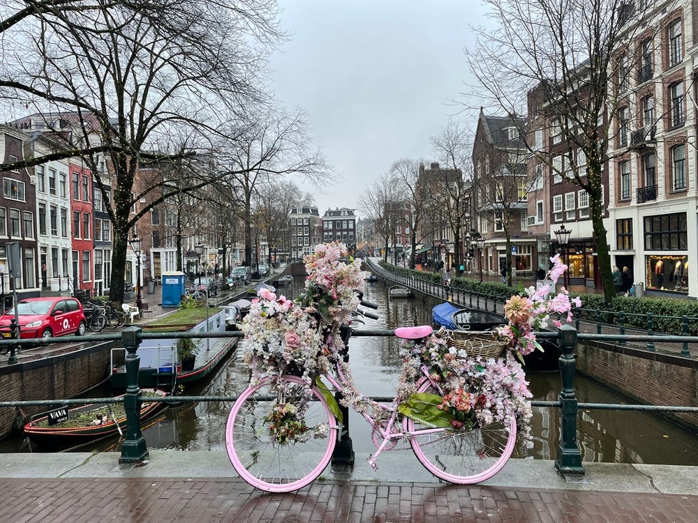 Pink Bike On The Canal Amsterdam