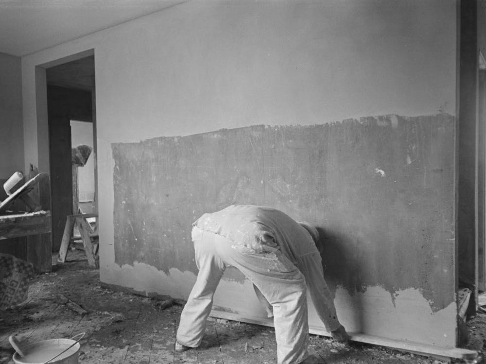 Man Plastering Wall In Greenhills, Ohio House By Russell Lee