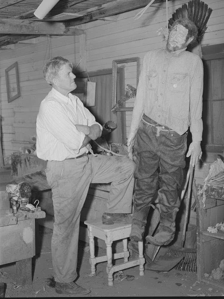 Homer Tate, Self Trained Artist, Looking At His Model Of A Hanged Horse Thief, Safford, Arizona By Russell Lee
