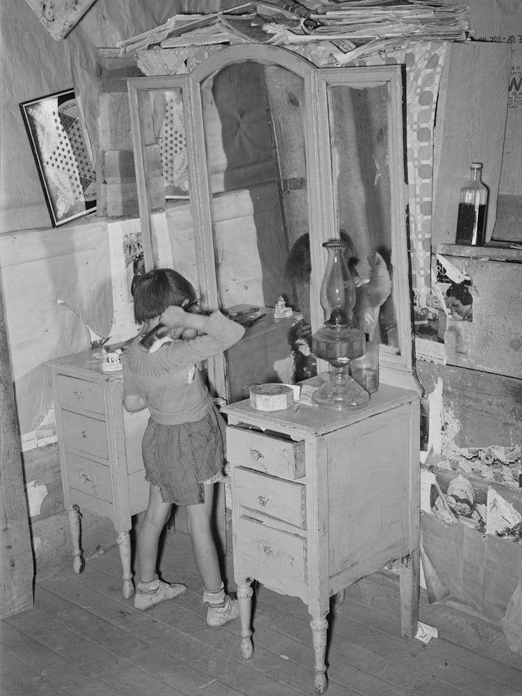 Josie Caudill, Homesteader S Daughter, Combs Her Hair, Pie Town, New Mexico By Russell Lee