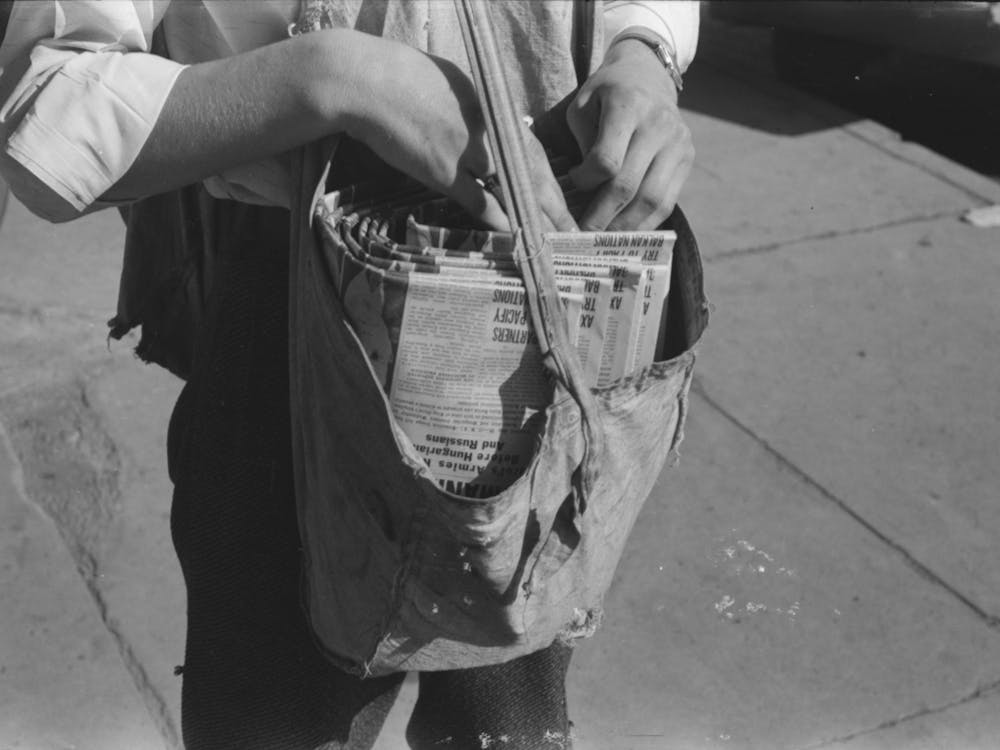 Newsboy S Sack Of Papers, Montrose, Colorado By Russell Lee