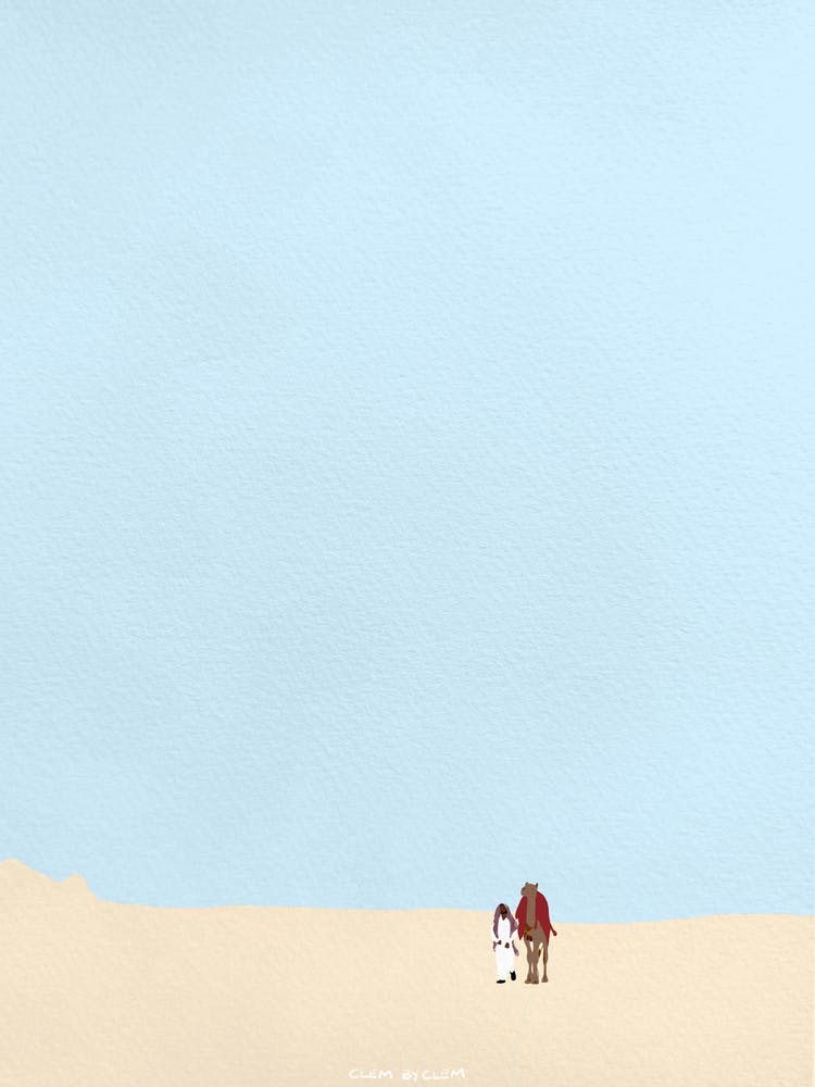 Camel walking the desert