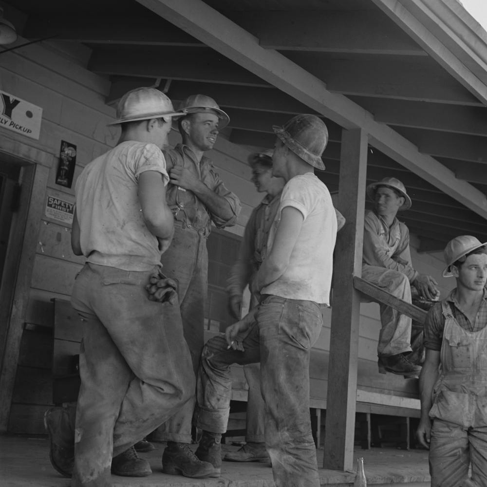 Untitled Photo, Possibly Related To Shasta Dam, Shasta County, California, Workman On The Porch Of The