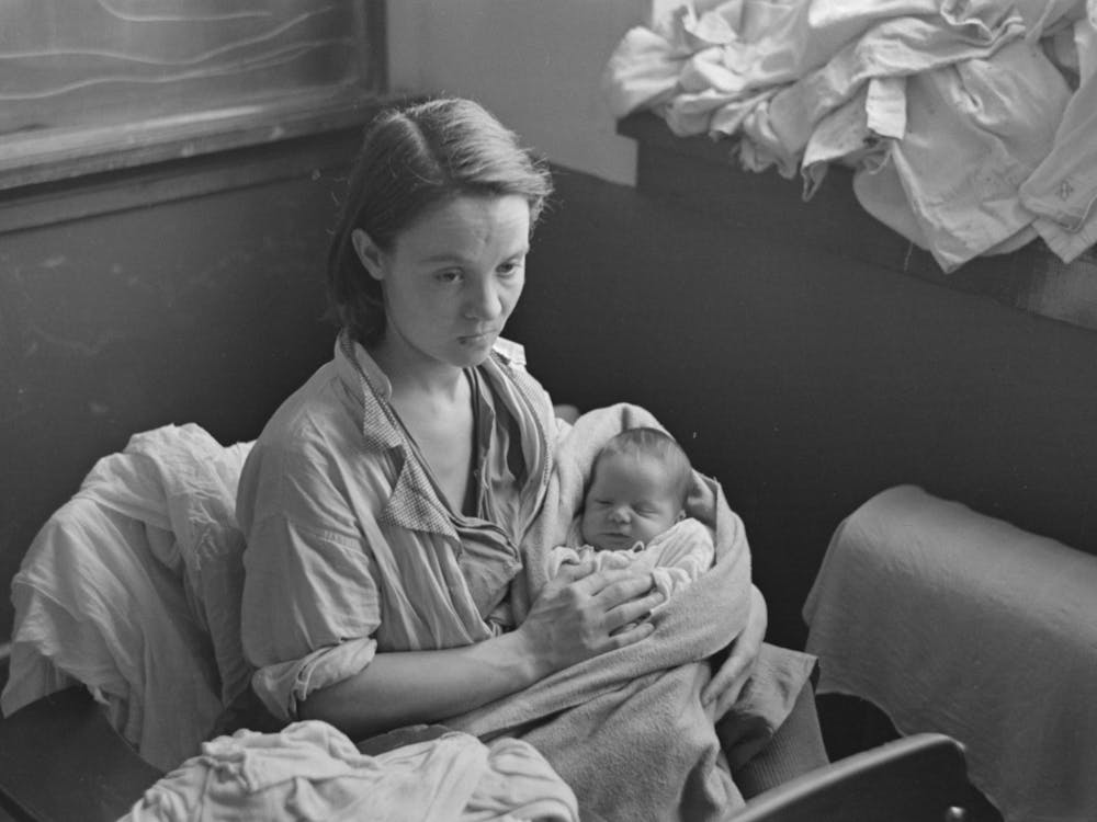 Woman And Child, Flood Refugees In Schoolhouse, Sikeston, Missouri By Russell Lee
