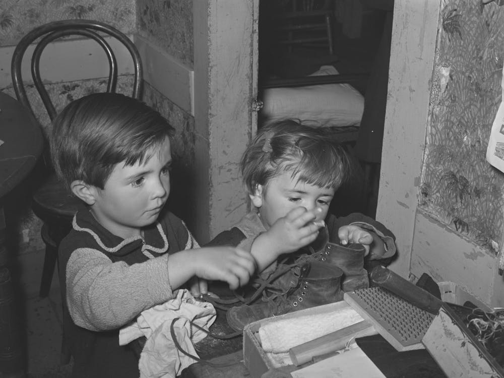 Farm Children Playing With Articles On Table, Farm Home Near Bradford, Vermont, Orange County By Russell Lee