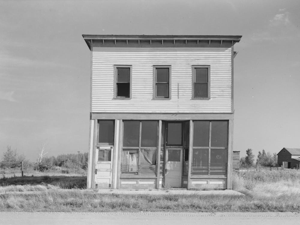 Abandoned Store Building And Old Sidewalk On What Was The Main Street, Gemmel, Minnesota By Russell Lee