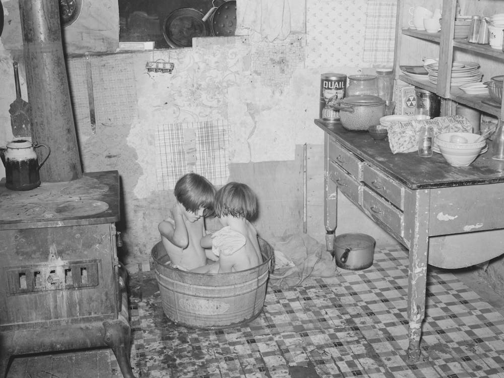 Children Taking Bath In Their Home In Community Camp, Oklahoma City, Oklahoma, See General Caption 21 By